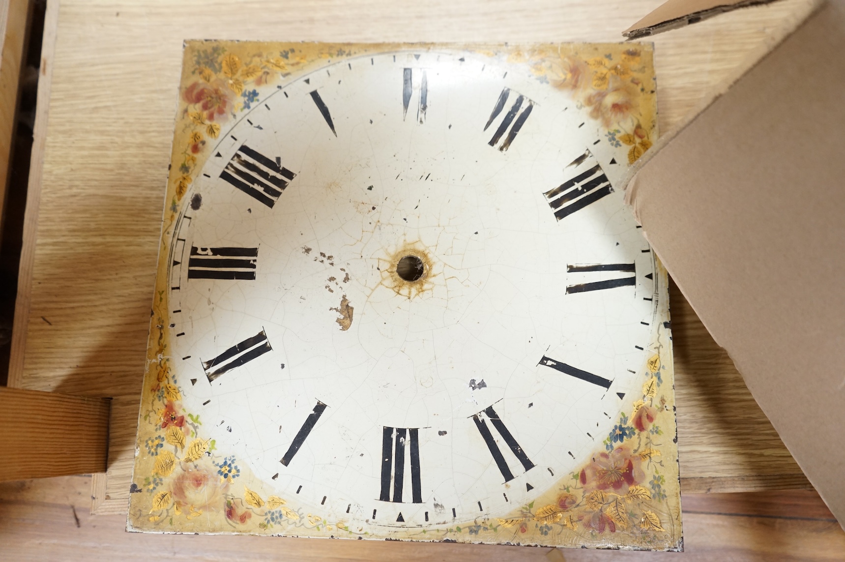 A brass dial wall clock, birdcage movement, 30cm square, unknown if working
